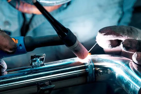 Stainless TIG welding on a metal pipe by Mobile Metal Services