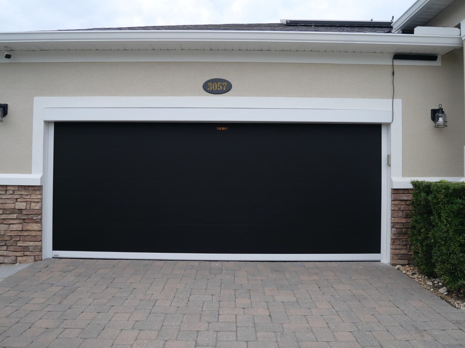 Garage-opening screen — completed installation