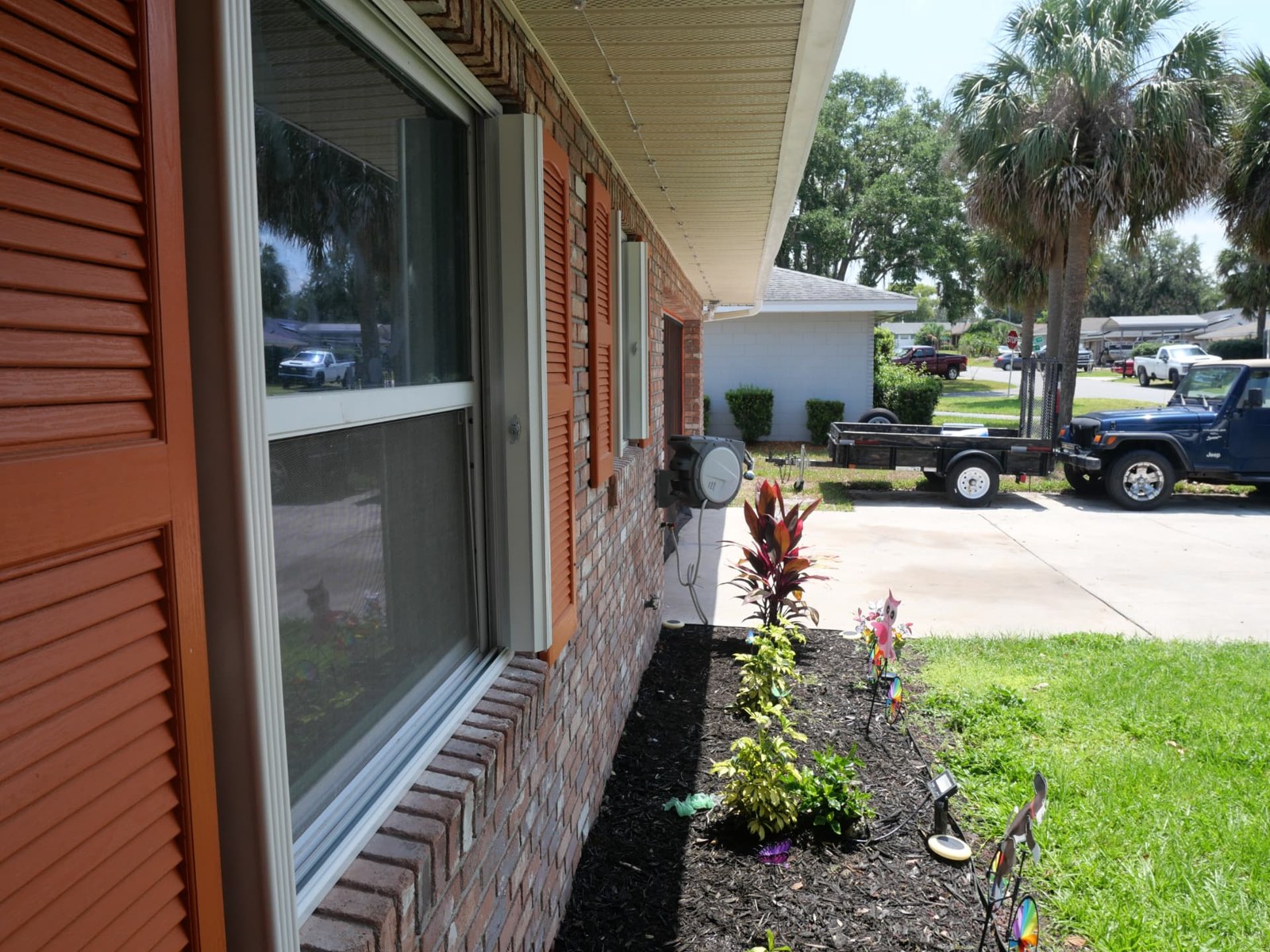 Side view of the retracted window shutters and tracks