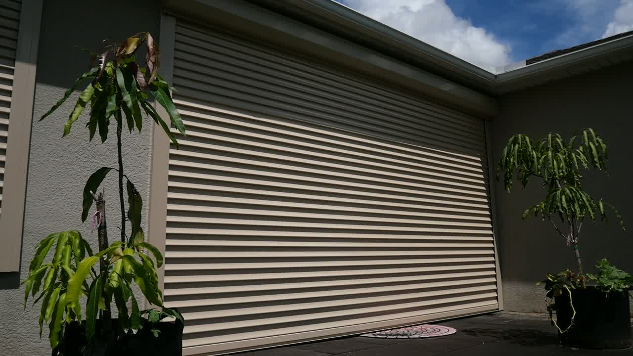 Wide patio roll-down shutter — still from our operation video