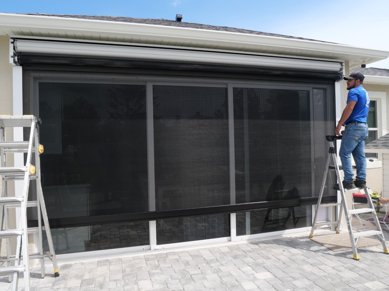 Patio screen installation over sliding glass doors